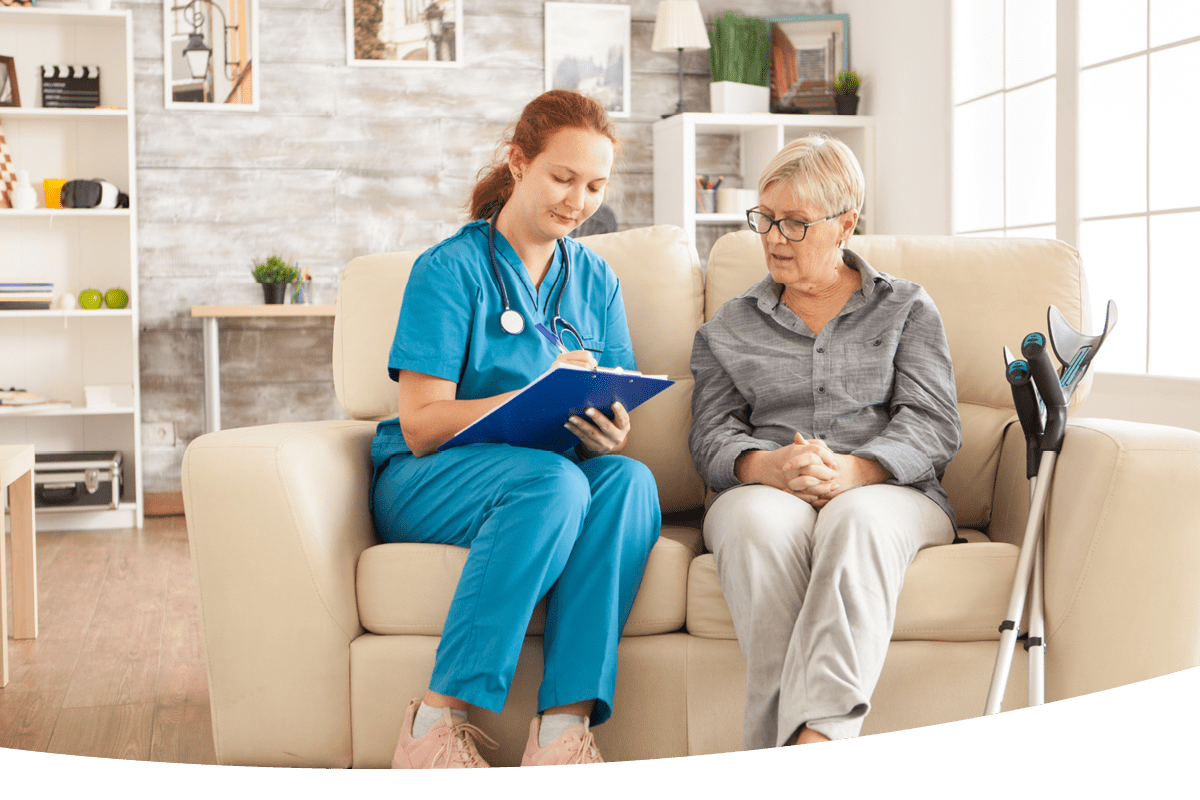 https://loudounrehab.com/wp-content/uploads/2023/02/nurse-explaining-healthcare-to-senior-woman.png